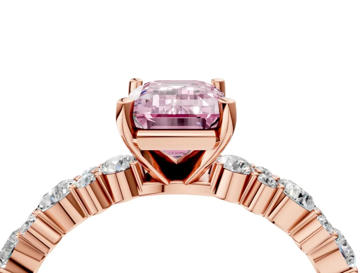 Fancy Pink Emerald Cut Diamond Side Stone Solitaire Ring with Round and Four-Prong Setting Rose gold