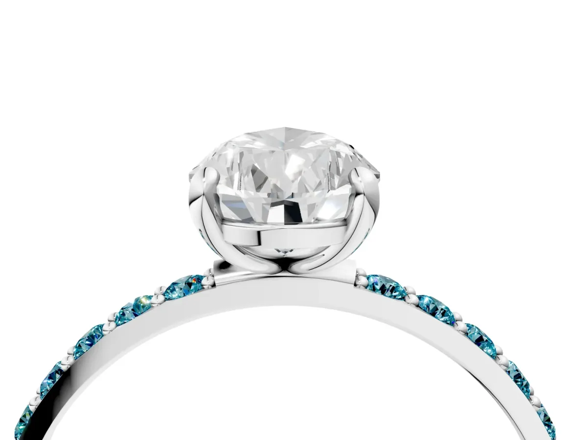 Pear Cut Diamond Solitaire Ring with Round Blue Topaz Pavé Band and Prong Setting Platinum