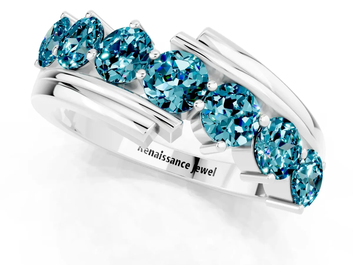 Round Blue Topaz Wave Band with Channel and Shared Prong Setting Platinum