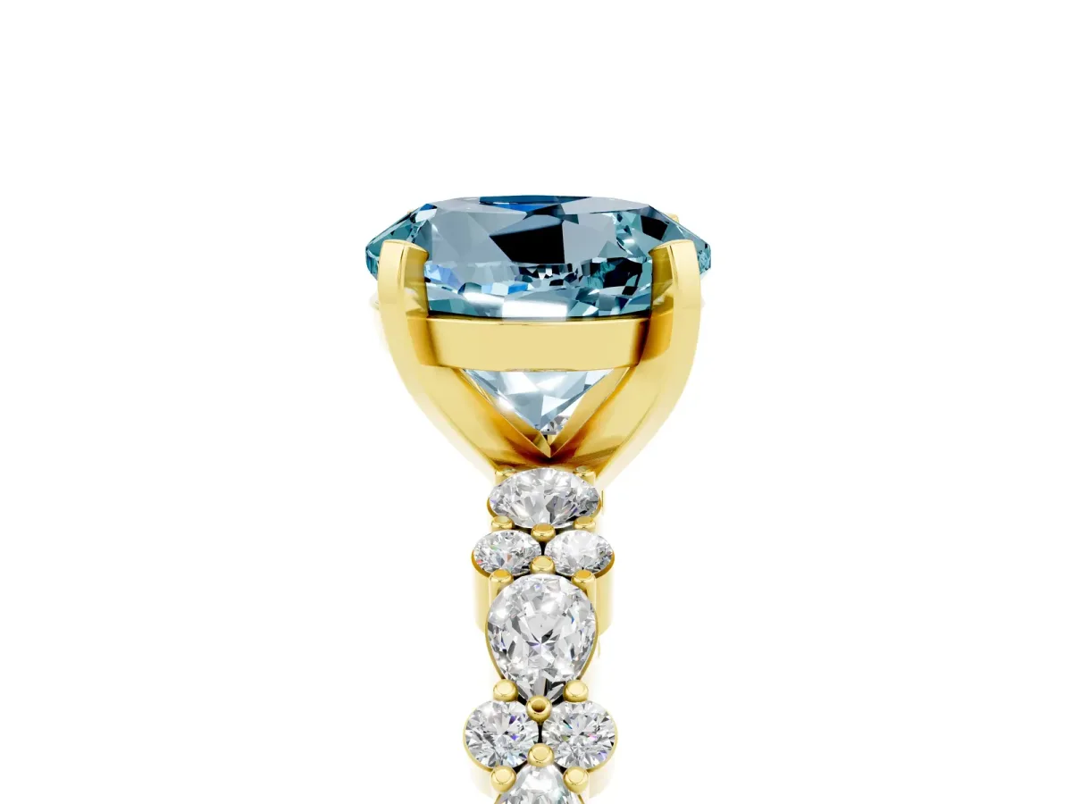 Round Cut Aquamarine Side Stone Solitaire Ring with Round and Four-Prong Setting Yellow gold