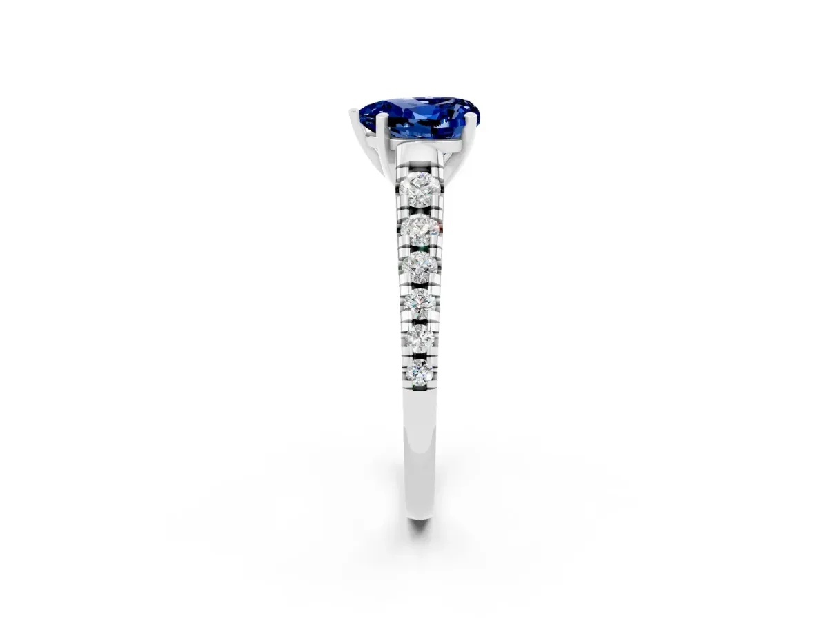 Heart Cut Blue Sapphire Cathedral Solitaire Ring with Round Pavé Band Platinum