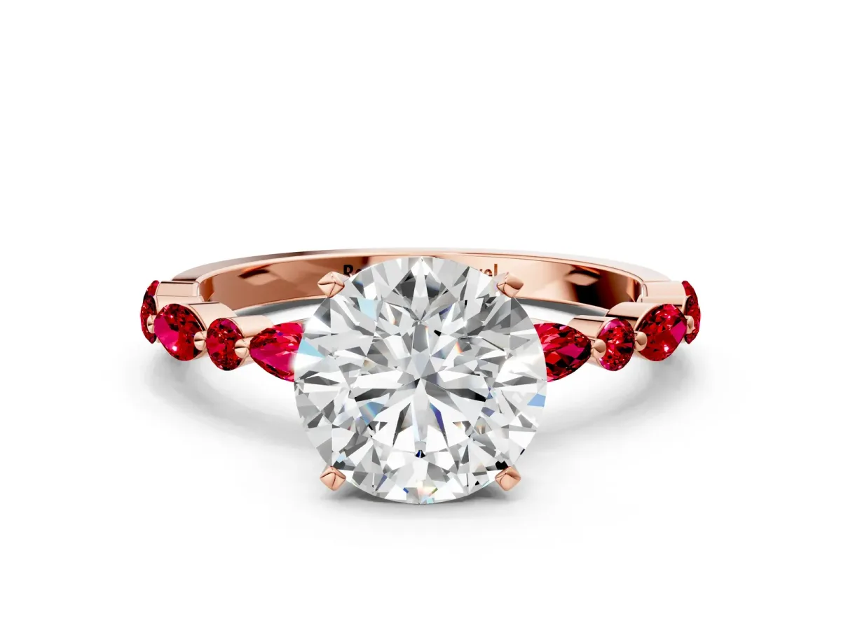 Round Cut Diamond Ring with Marquise and Round Ruby Side Stones and Four-Prong Setting Rose gold