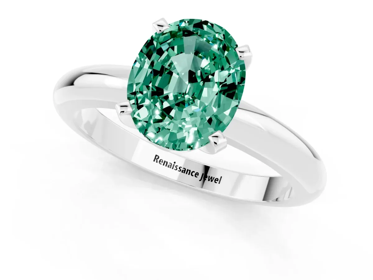 Oval Cut Green Sapphire Solitaire Engagement Ring with Round Band and Four-Prong Setting Platinum