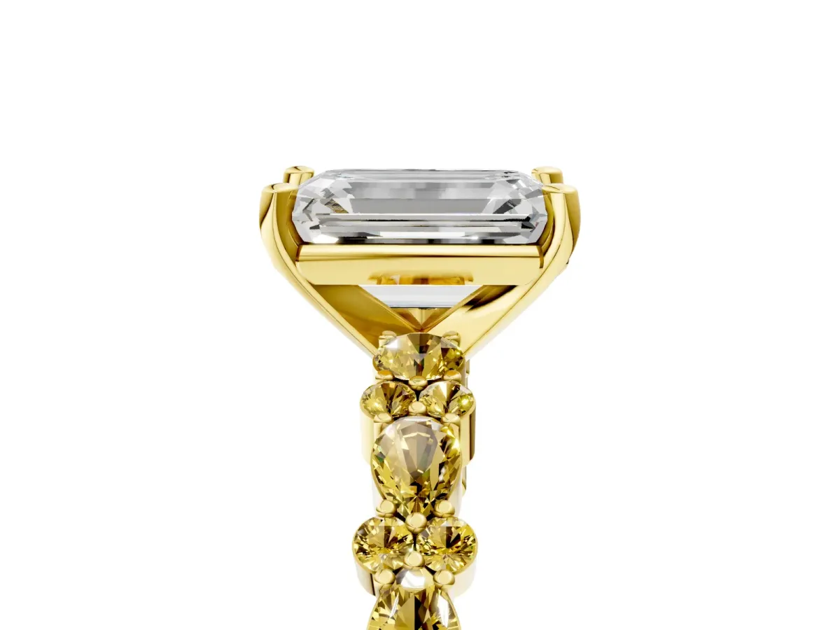 Emerald Cut Diamond Side Stone Solitaire Ring with Round Yellow Sapphire and Four-Prong Setting Yellow gold