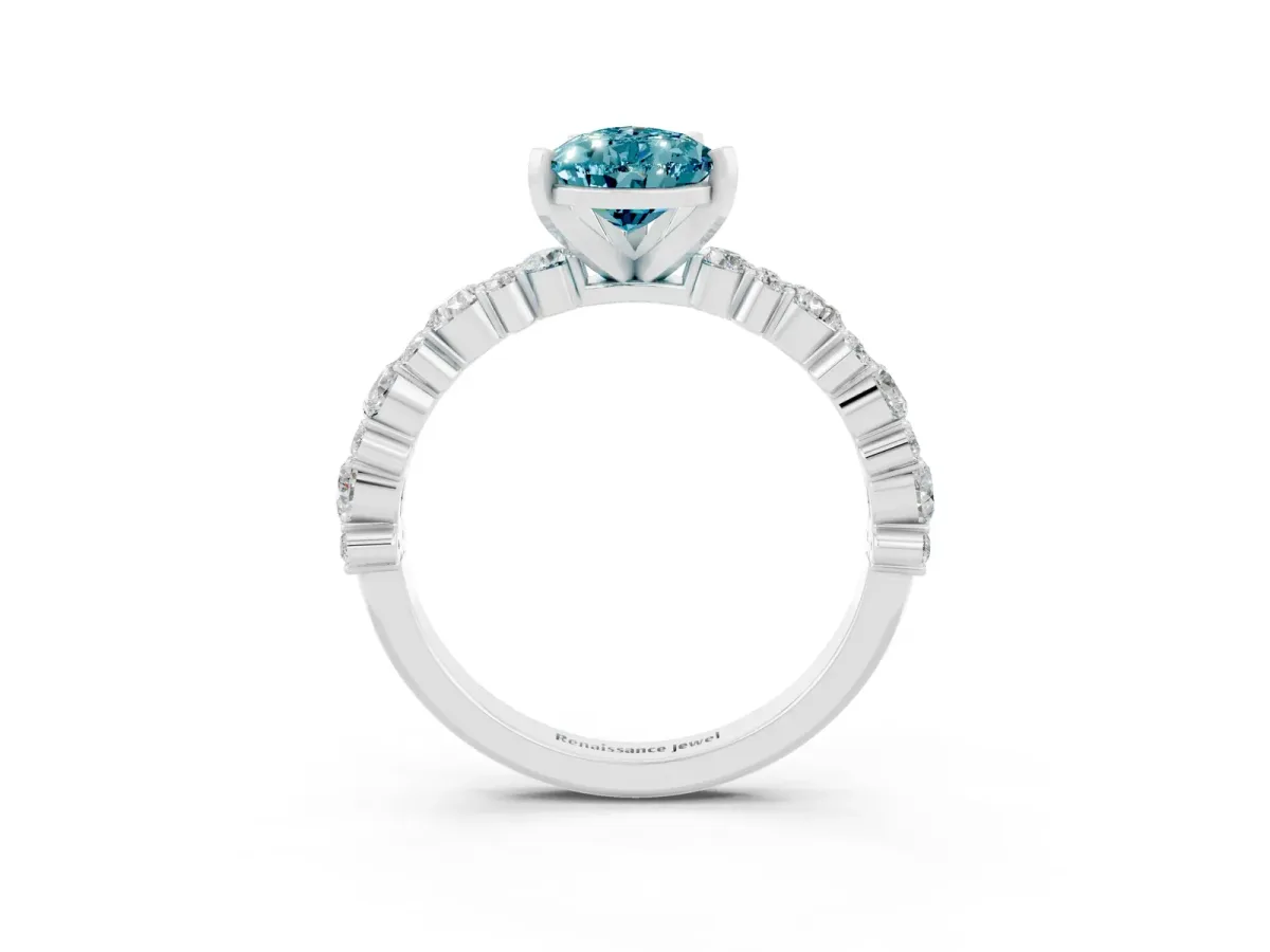 Pear Cut Blue Topaz Side Stone Solitaire Ring with Round and Four-Prong Setting White gold
