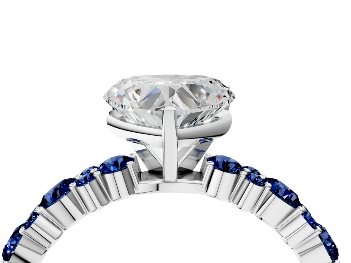 Heart Cut Diamond Side Stone Solitaire Ring with Round Blue Sapphire and Four-Prong Setting White gold