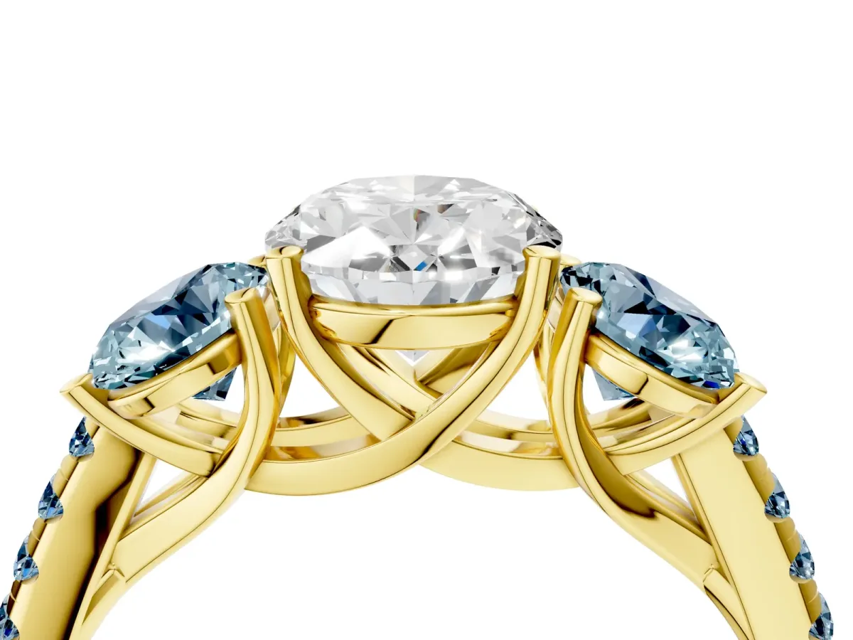 Three-Stone Oval Cut Diamond Ring with Round Aquamarine Pavé Band and Prong Setting Yellow gold