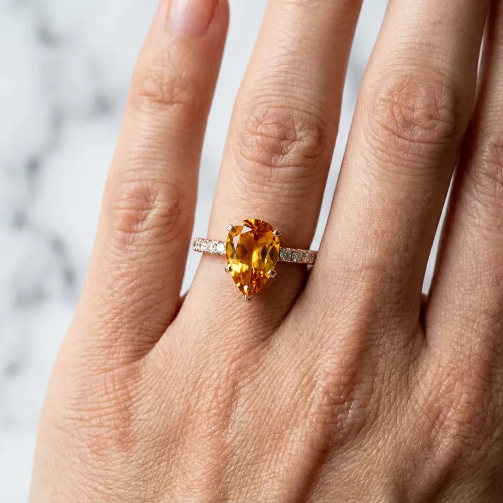Pear Cut Citrine Solitaire Ring with Round Pavé Band and Four-Prong Setting Rose gold