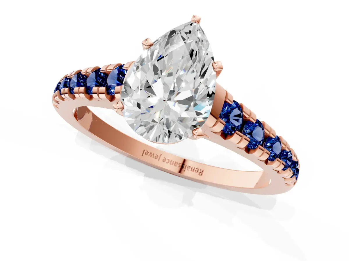 Pear Cut Diamond Cathedral Solitaire Ring with Round Blue Sapphire Pavé Band Rose gold
