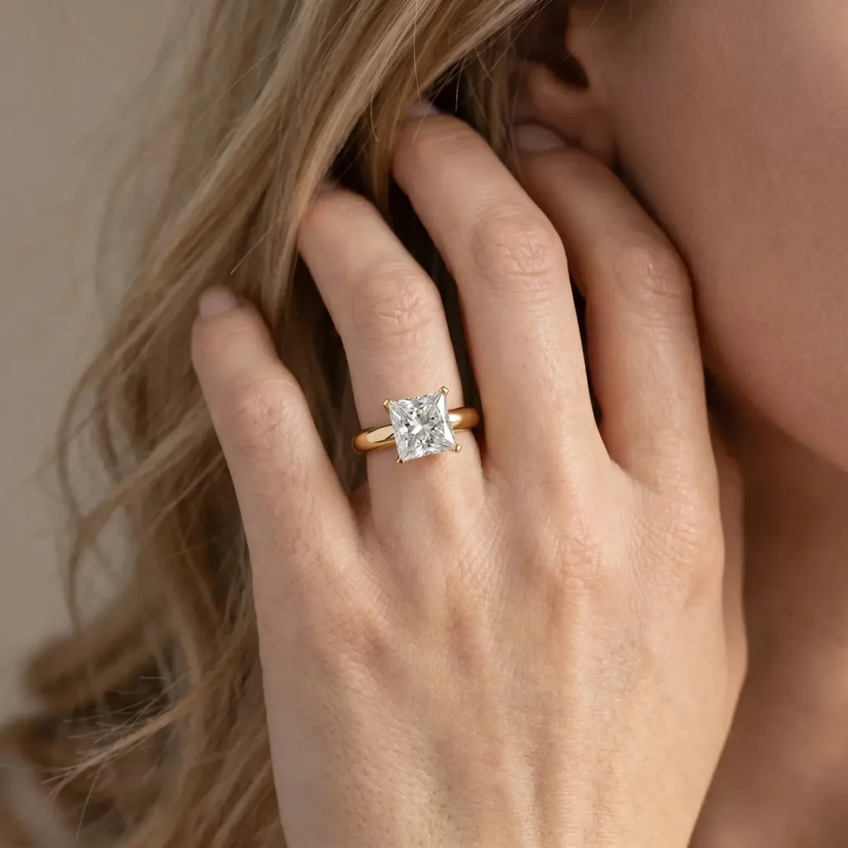 Princess Cut Diamond Solitaire Engagement Ring with Round Band and Four-Prong Setting Yellow gold