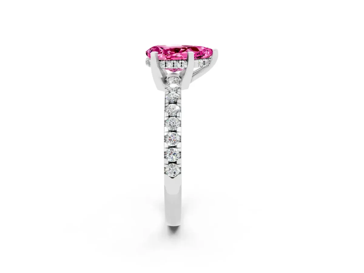 Pear Cut Pink Sapphire Solitaire Ring with Round Pavé Band and Four-Prong Setting Silver