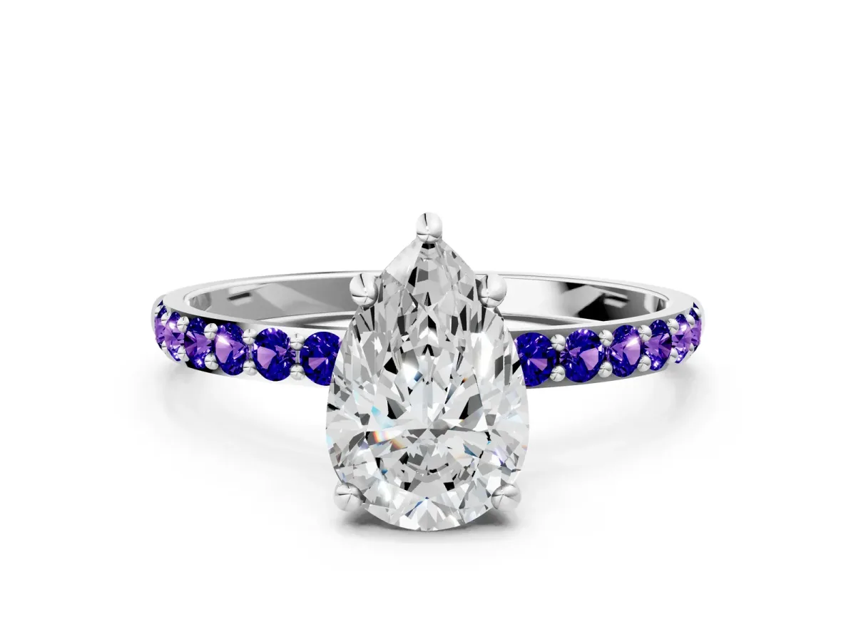 Pear Cut Diamond Solitaire Ring with Round Tanzanite Pavé Band and Prong Setting Platinum