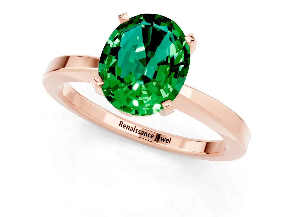 Oval Cut Emerald Solitaire Engagement Ring with Classic Band and Four-Prong Setting Rose gold