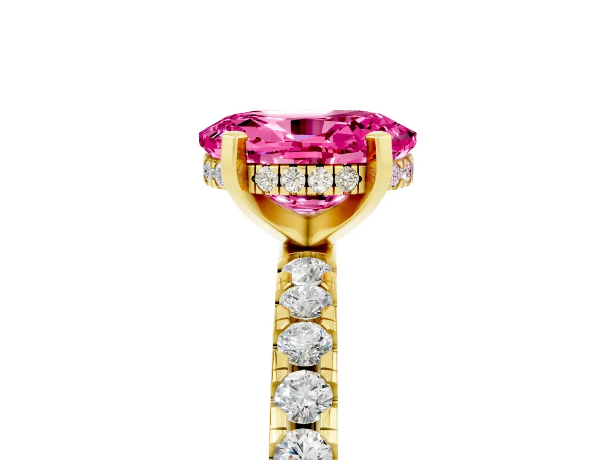 Oval Cut Pink Sapphire Solitaire Ring with Round Pavé Band and Four-Prong Setting Yellow gold