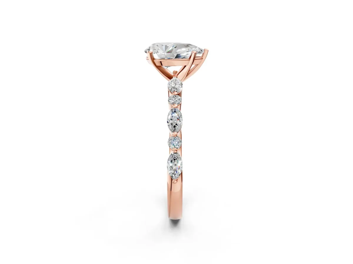 Pear Cut Diamond Ring with Marquise and Round Side Stones and Four-Prong Setting Rose gold