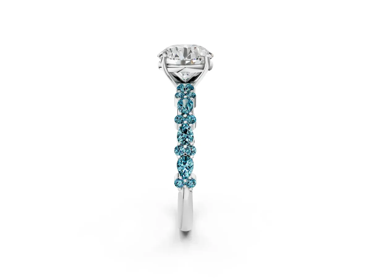 Round Cut Diamond Side Stone Solitaire Ring with Round Tanzanite and Four-Prong Setting Silver