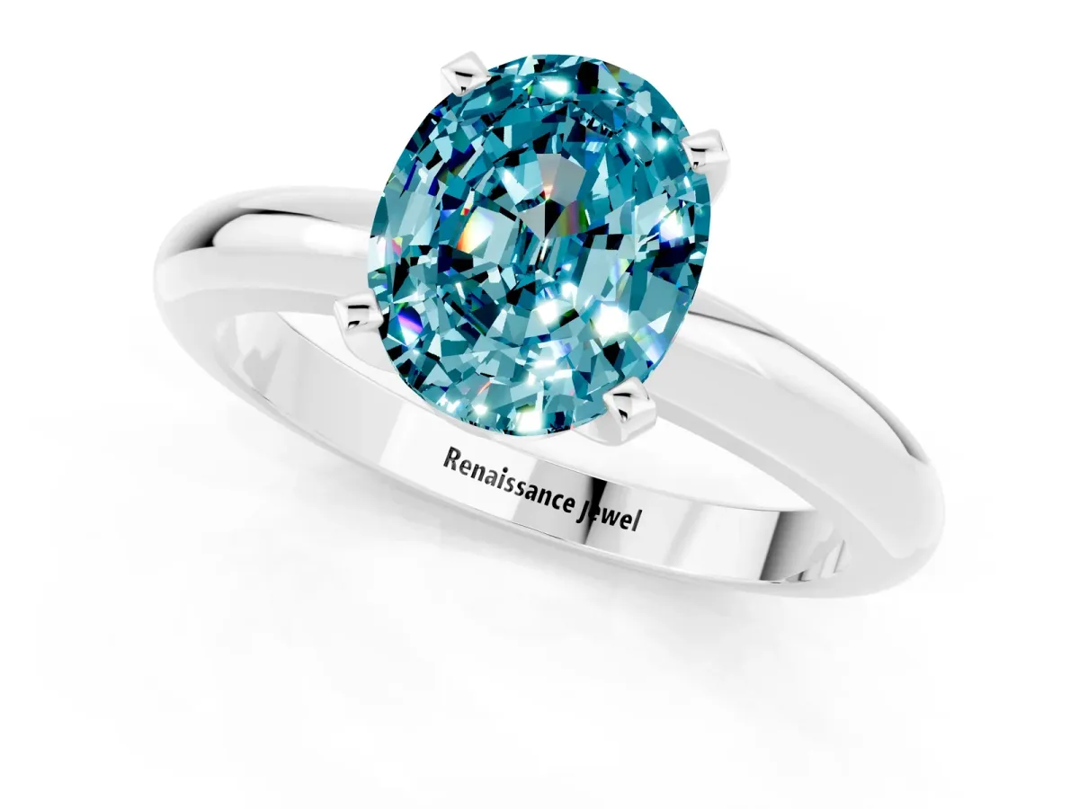 Oval Cut Blue Topaz Solitaire Engagement Ring with Round Band and Four-Prong Setting Platinum