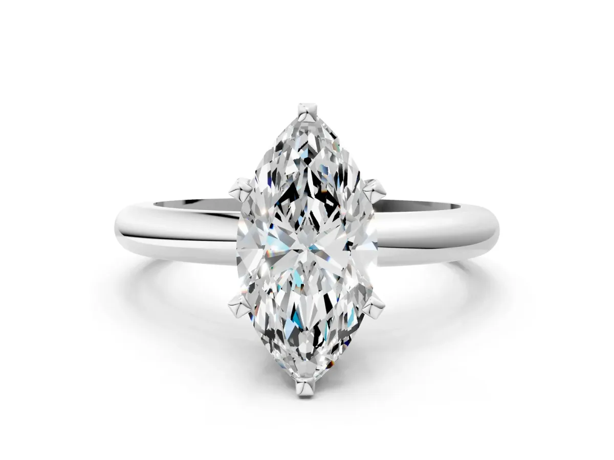 Marquise Cut Diamond Solitaire Engagement Ring with Round Band and Four-Prong Setting Platinum