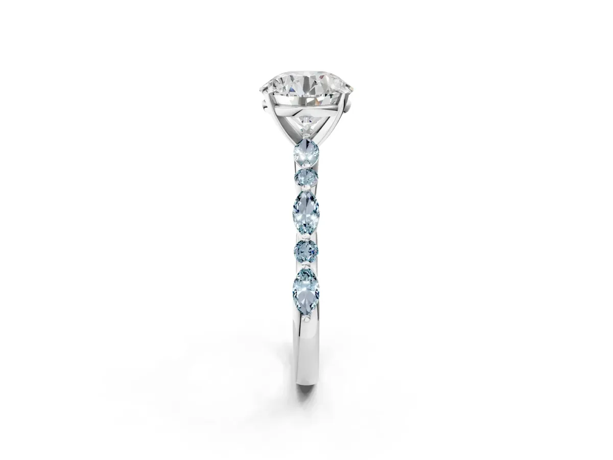 Round Cut Diamond Ring with Marquise and Round Aquamarine Side Stones and Four-Prong Setting Platinum