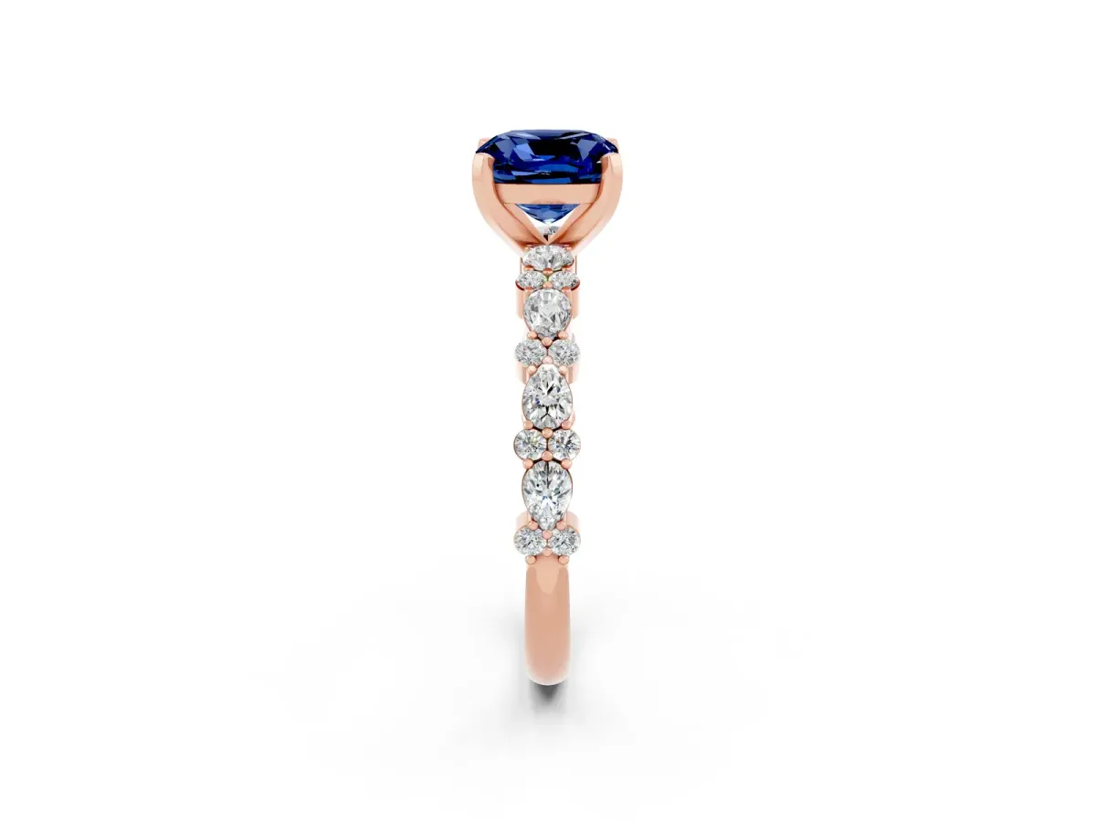 Cushion Cut Blue Sapphire Side Stone Solitaire Ring with Round and Four-Prong Setting Rose gold