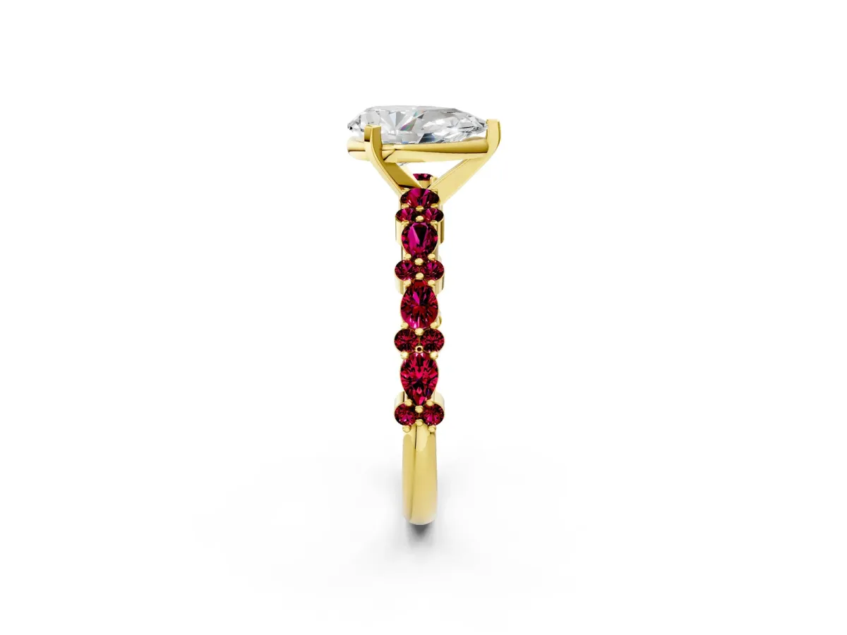 Pear Cut Diamond Side Stone Solitaire Ring with Round Garnet and Four-Prong Setting Yellow gold