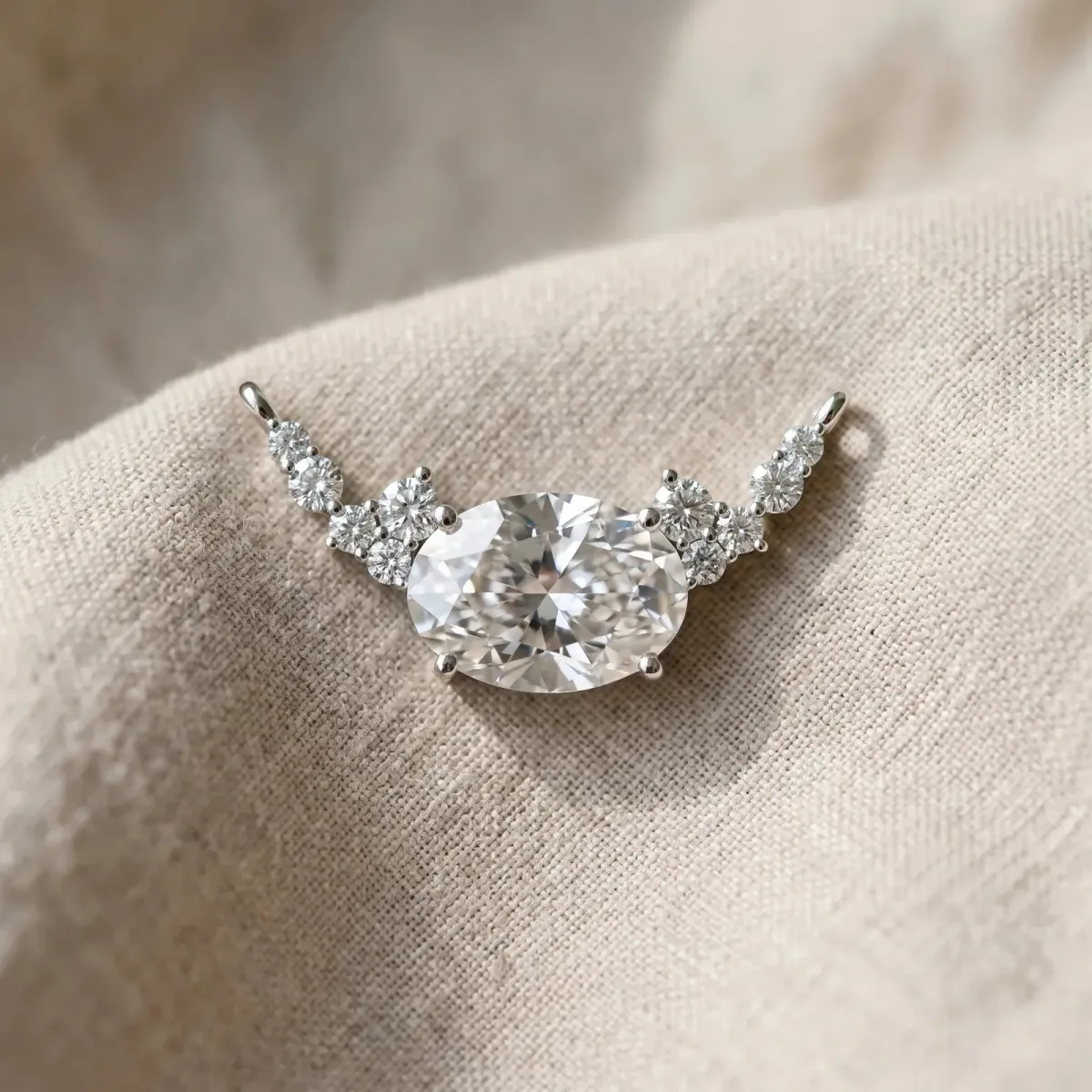 Oval Diamond Pendant with Heart Accents and Prong Setting Silver