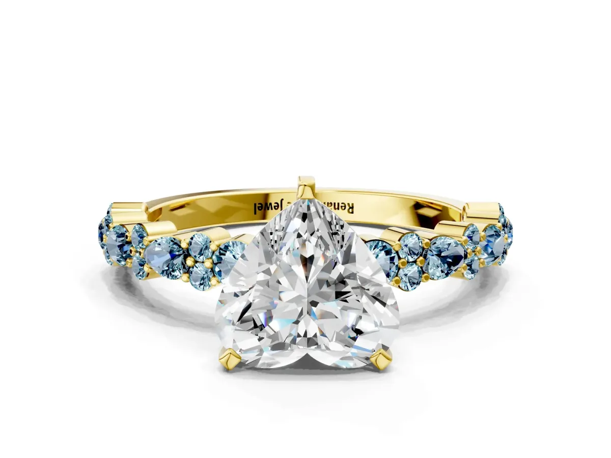 Heart Cut Diamond Side Stone Solitaire Ring with Round Aquamarine and Four-Prong Setting Yellow gold