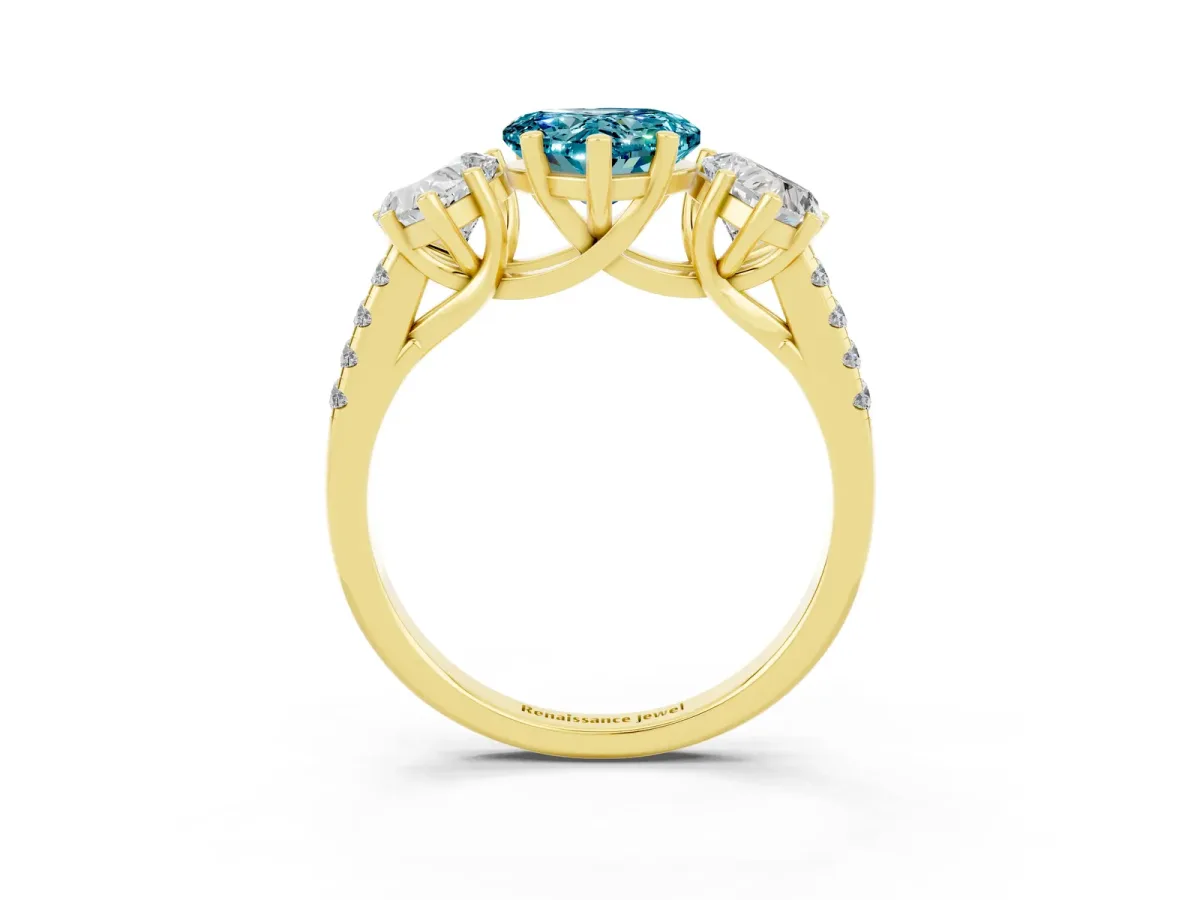 Three-Stone Heart Cut Blue Topaz Ring with Round Pavé Band and Prong Setting Yellow gold