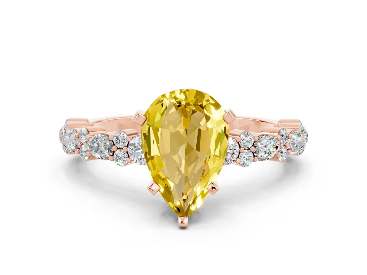 Pear Cut Yellow Sapphire Side Stone Solitaire Ring with Round and Four-Prong Setting Rose gold