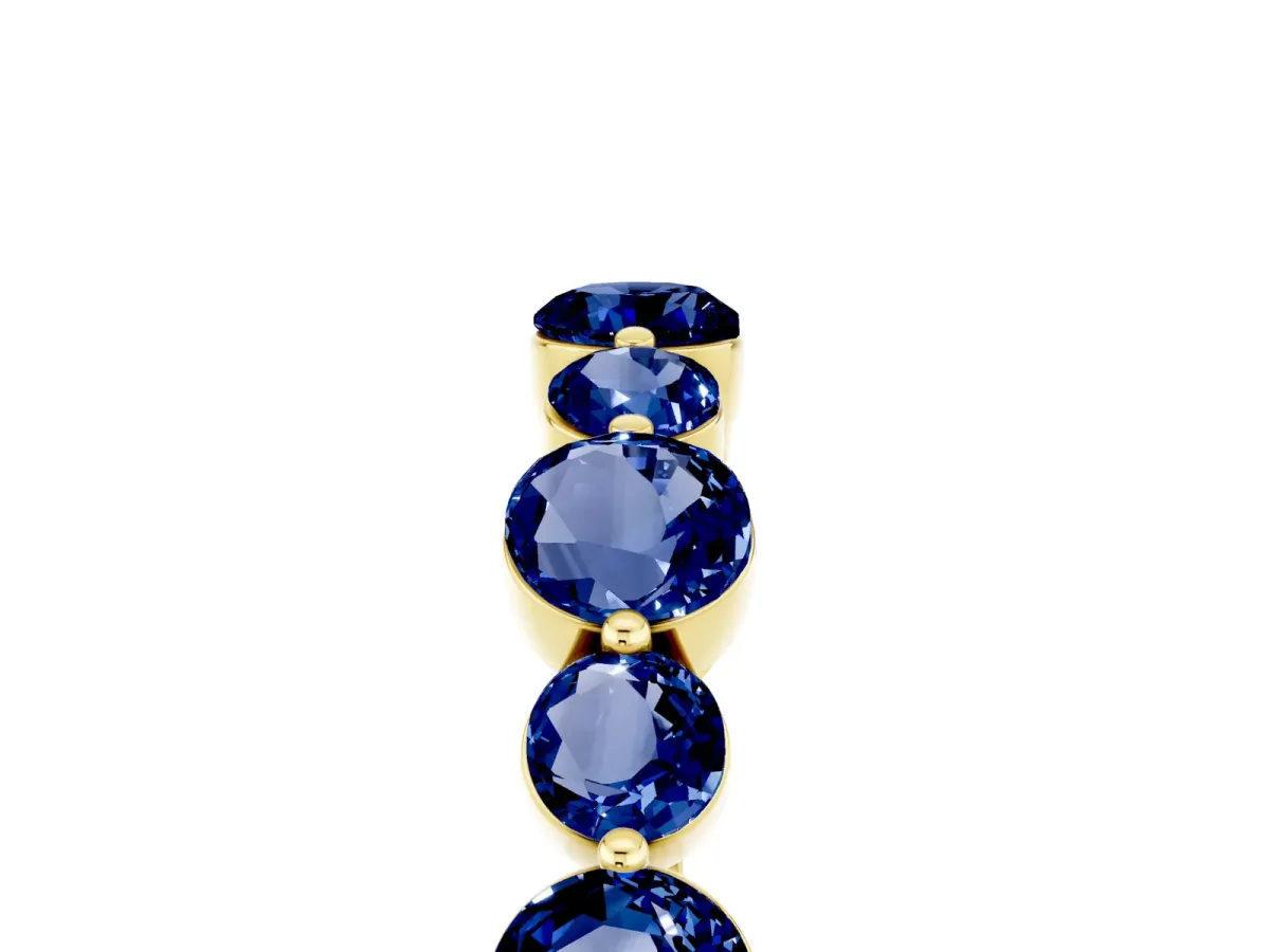 Round Blue Sapphire Scalloped Prong Set Eternity Band Yellow gold