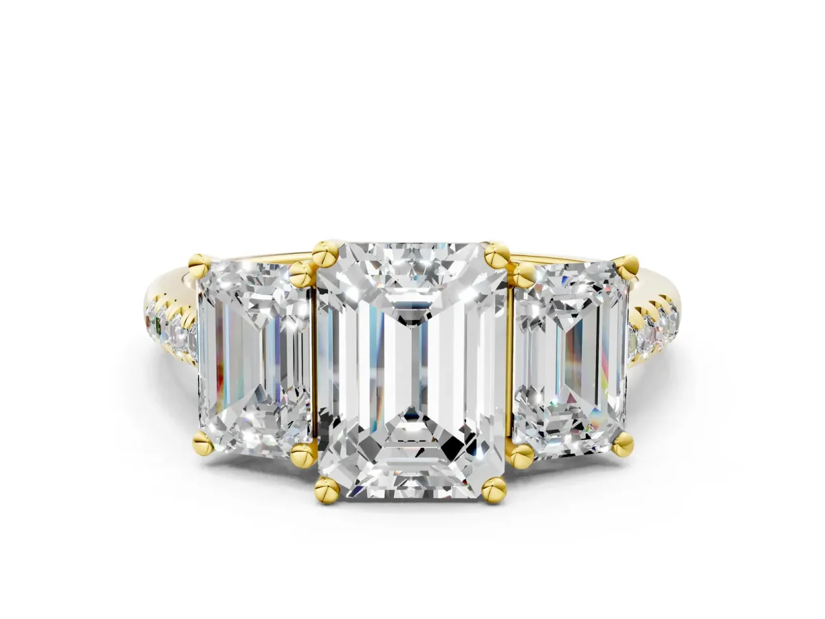 Three-Stone Emerald Cut Diamond Ring with Round Pavé Band and Prong Setting Yellow gold