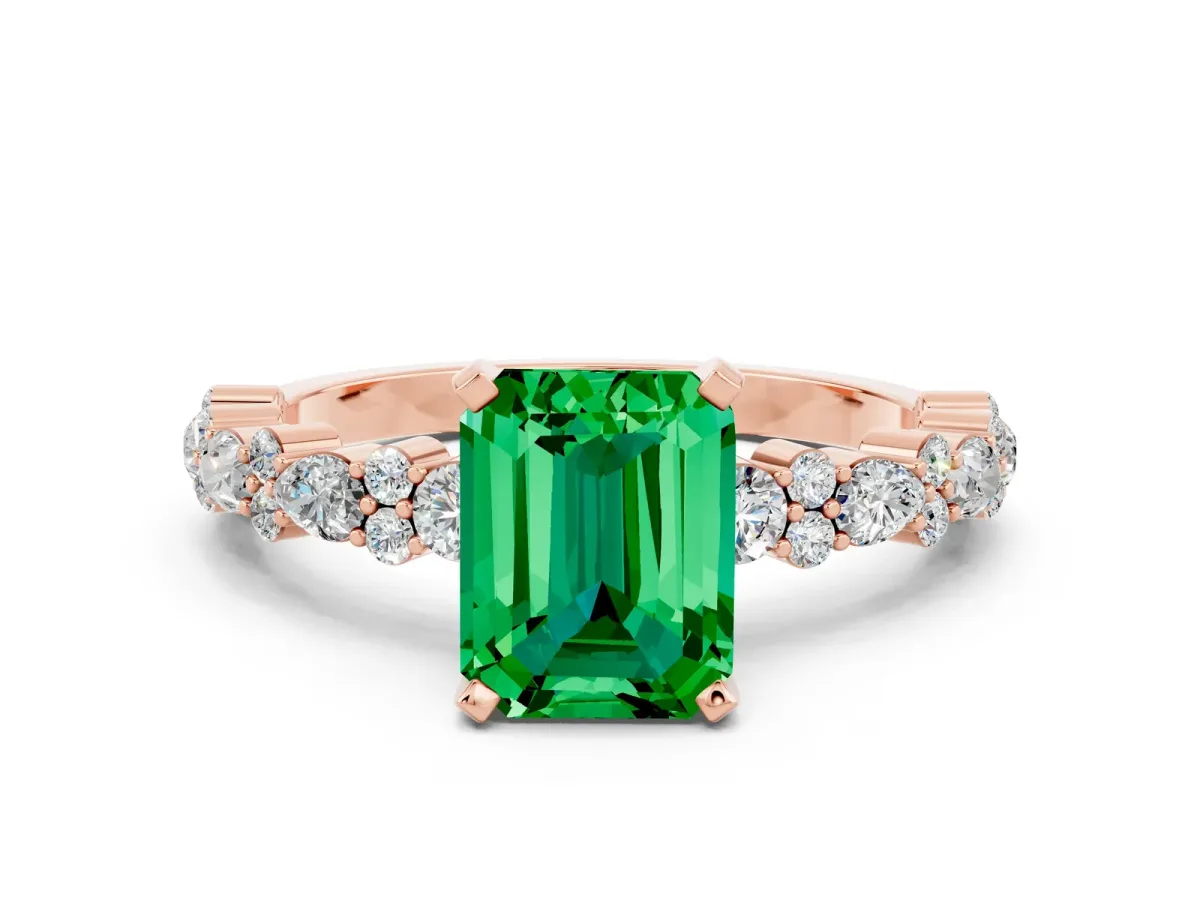 Emerald Cut Emerald Side Stone Solitaire Ring with Round and Four-Prong Setting Rose gold