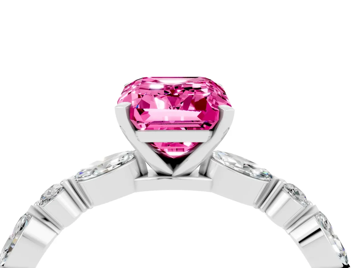 Emerald Cut Pink Sapphire Ring with Marquise and Round Side Stones and Four-Prong Setting Silver