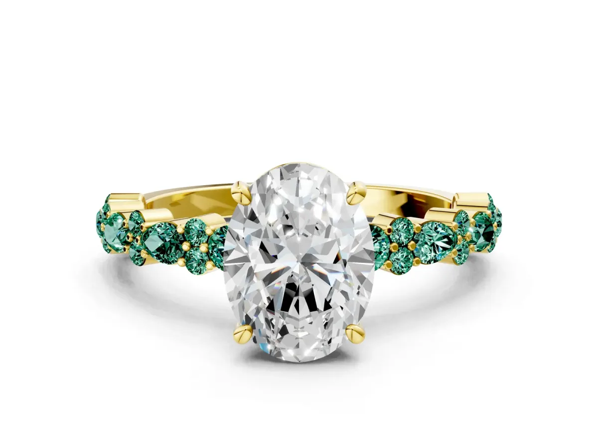 Oval Cut Diamond Side Stone Solitaire Ring with Round Green Sapphire and Four-Prong Setting Yellow gold