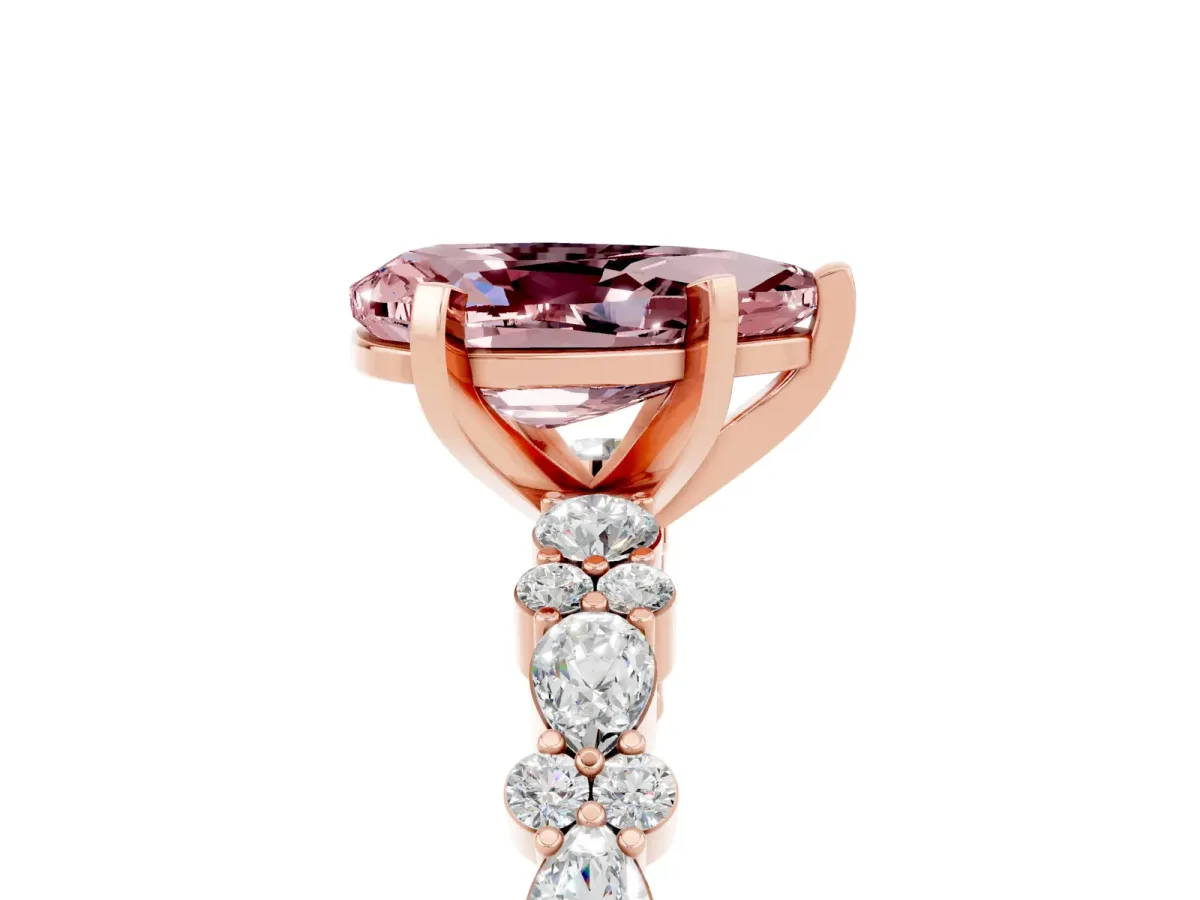 Pear Cut Morganite Side Stone Solitaire Ring with Round and Four-Prong Setting Rose gold