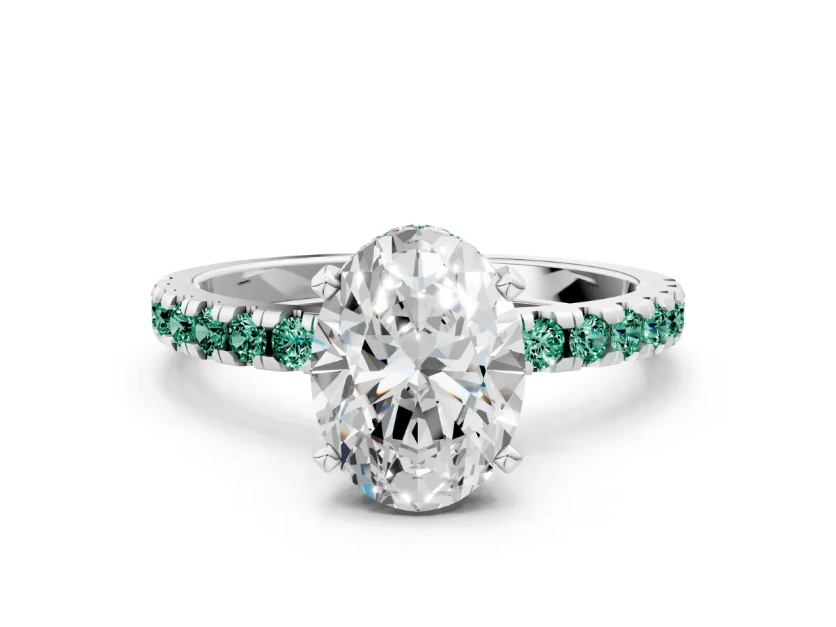 Oval Cut Diamond Solitaire Ring with Round Green Sapphire Pavé Band and Four-Prong Setting Silver