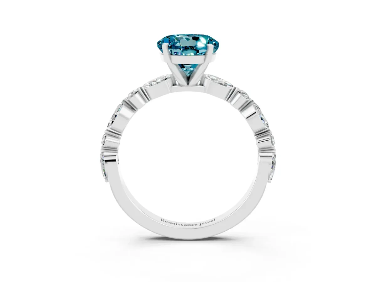 Round Cut Blue Topaz Ring with Marquise and Round Side Stones and Four-Prong Setting Silver