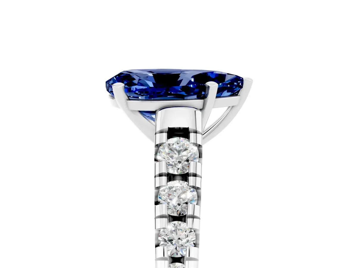 Pear Cut Blue Sapphire Cathedral Solitaire Ring with Round Pavé Band White gold