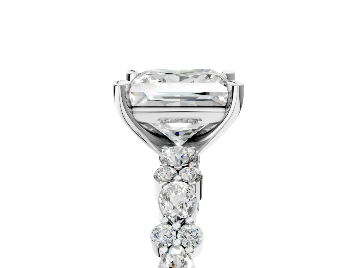 Princess Cut Diamond Side Stone Solitaire Ring with Round and Four-Prong Setting Platinum