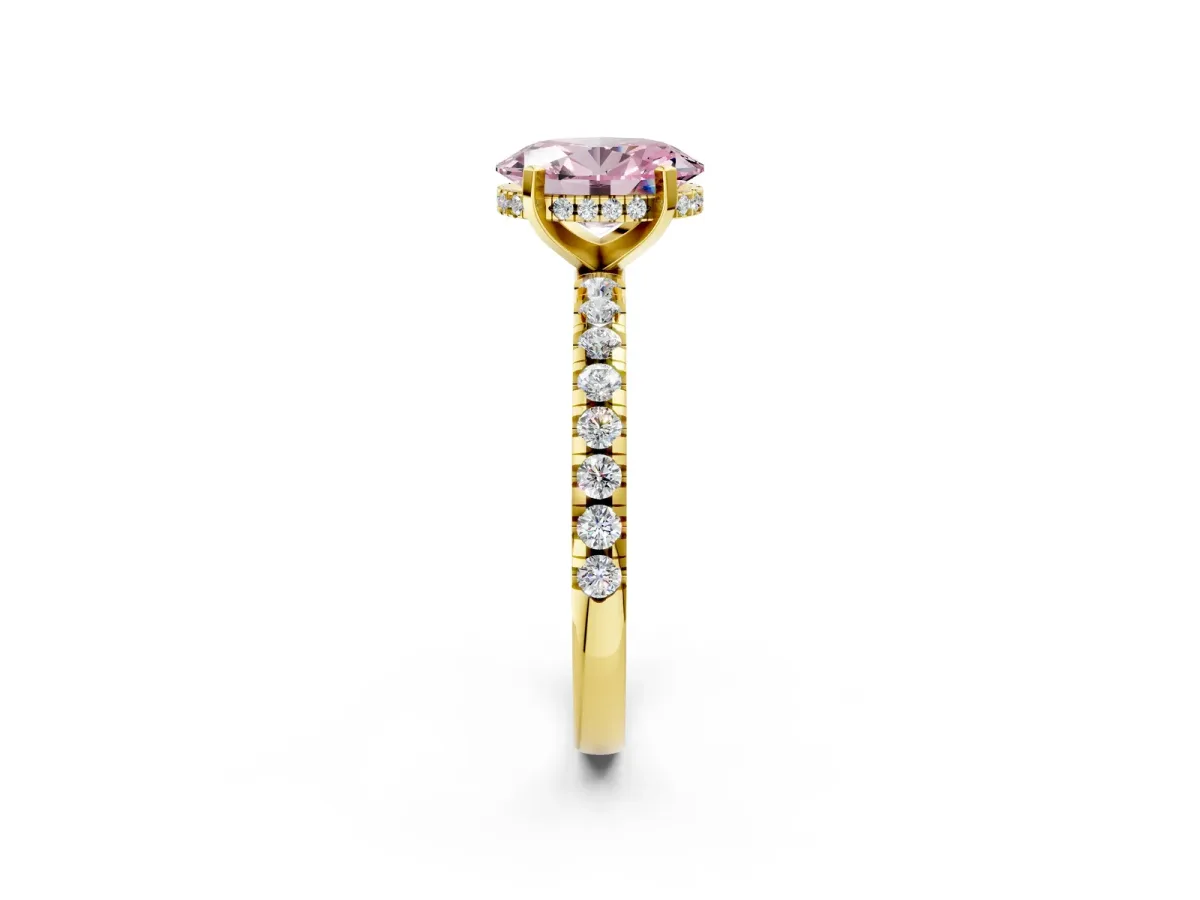 Fancy Pink Oval Cut Diamond Solitaire Ring with Round Pavé Band and Four-Prong Setting Yellow gold