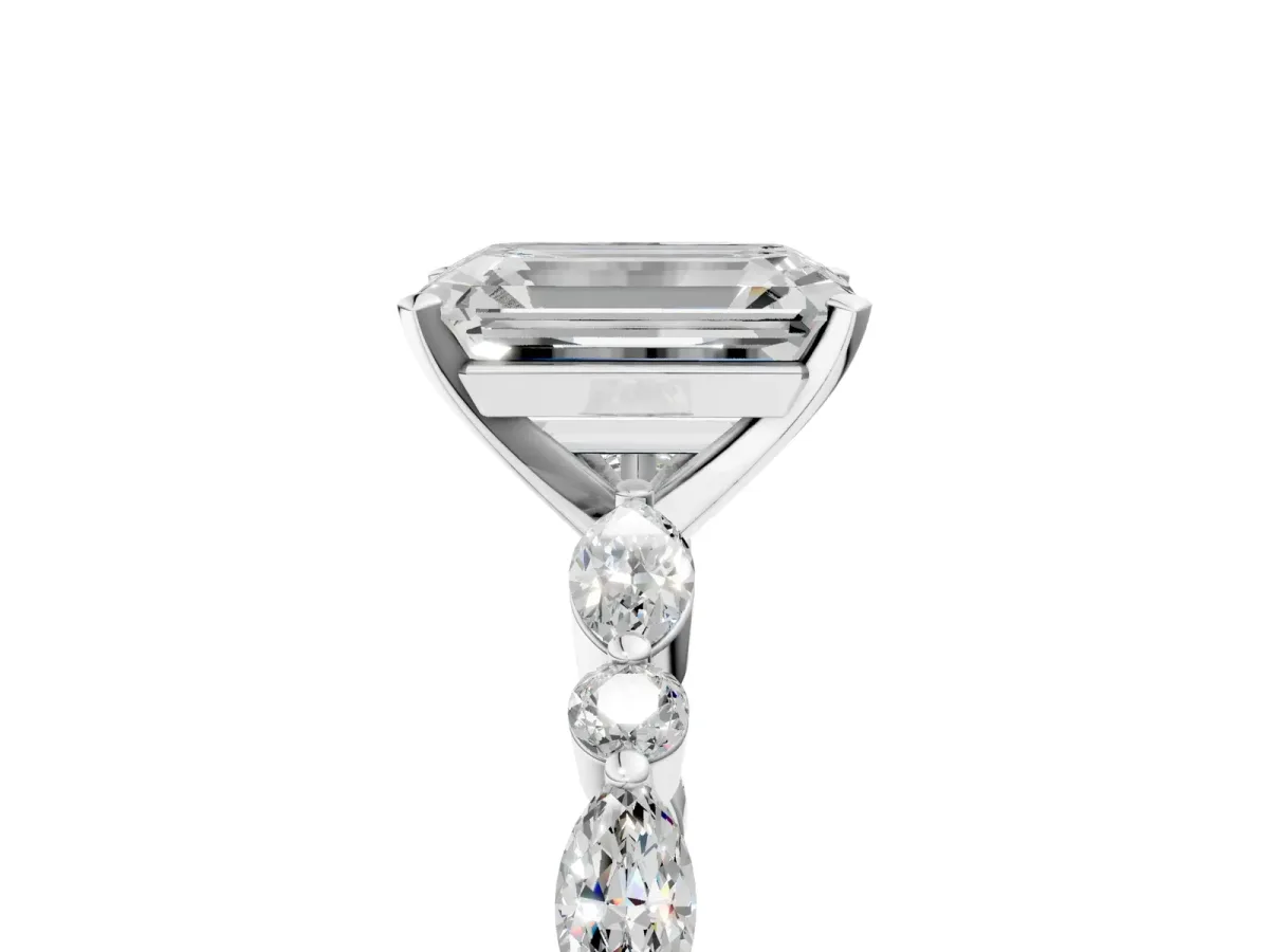 Emerald Cut Diamond Ring with Marquise and Round Side Stones and Four-Prong Setting Silver