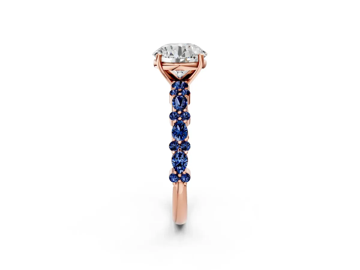 Round Cut Diamond Side Stone Solitaire Ring with Round Blue Sapphire and Four-Prong Setting Rose gold