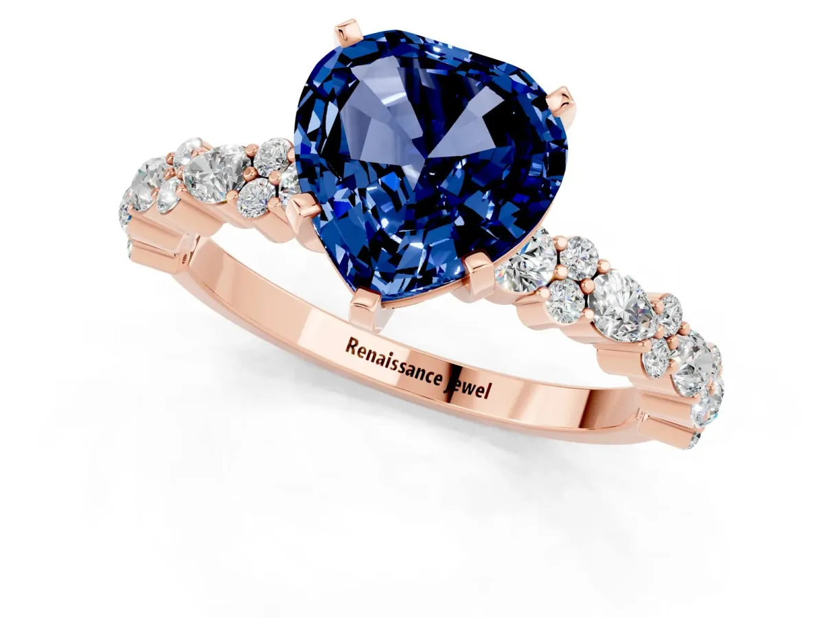 Heart Cut Blue Sapphire Side Stone Solitaire Ring with Round and Four-Prong Setting Rose gold