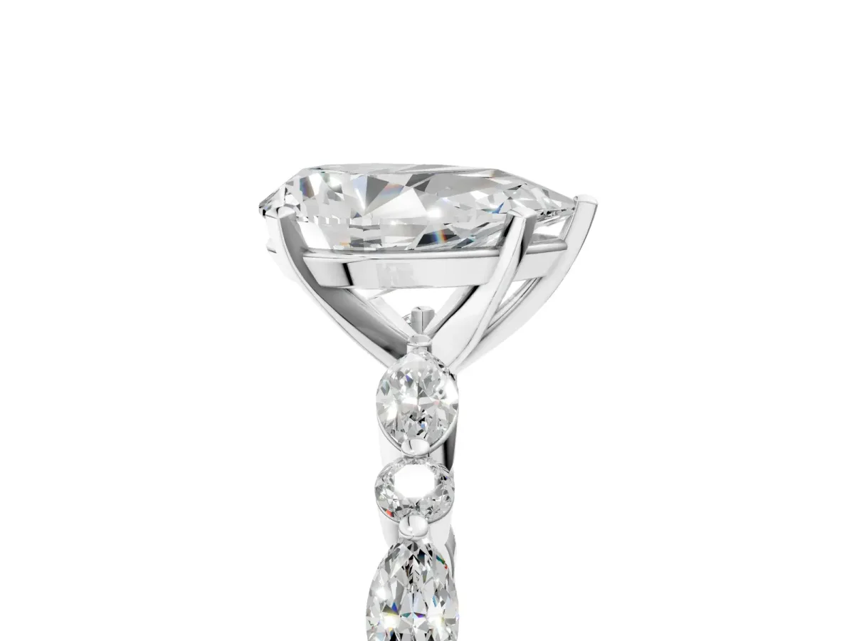 Pear Cut Diamond Ring with Marquise and Round Side Stones and Four-Prong Setting White gold