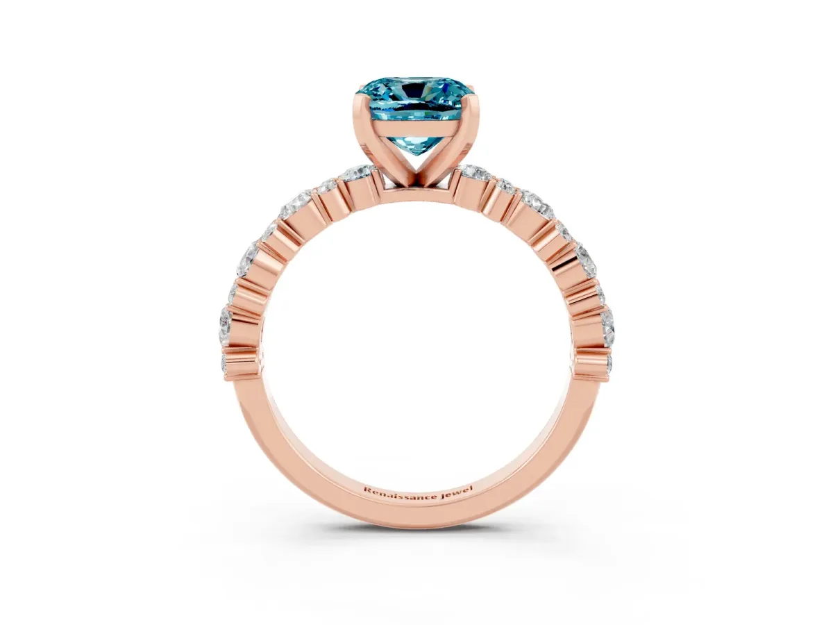 Cushion Cut Blue Topaz Side Stone Solitaire Ring with Round and Four-Prong Setting Rose gold