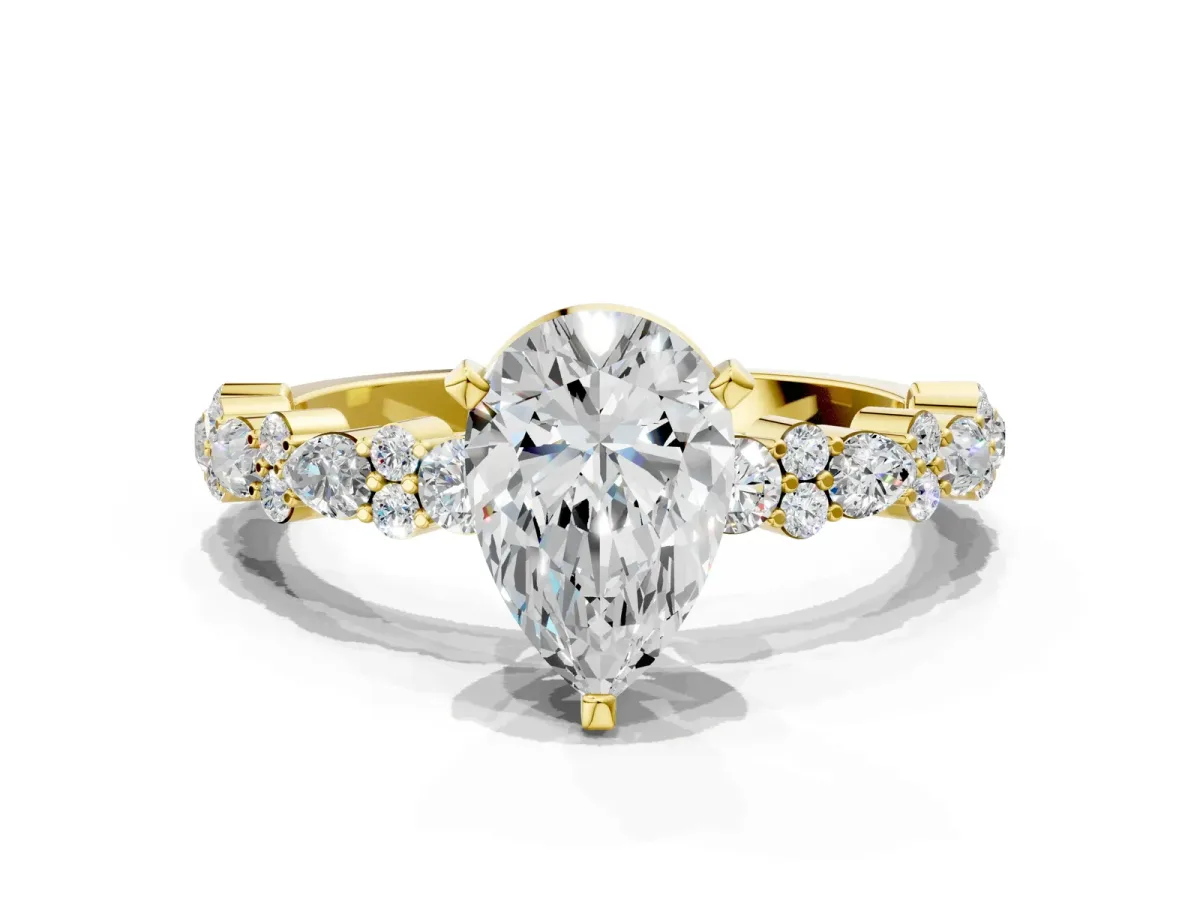 Pear Cut Diamond Side Stone Solitaire Ring with Round Moissanite and Four-Prong Setting Yellow gold
