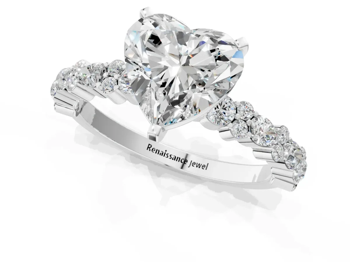 Heart Cut Diamond Side Stone Solitaire Ring with Round and Four-Prong Setting Platinum
