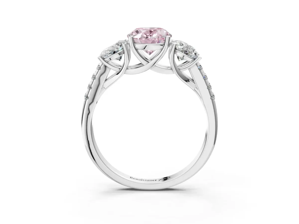 Fancy Pink Three-Stone Oval Cut Diamond Ring with Round Pavé Band and Prong Setting White gold