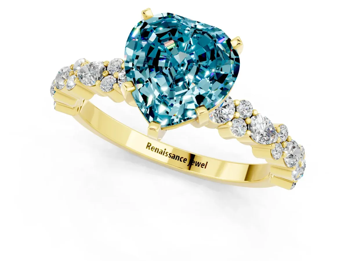 Heart Cut Blue Topaz Side Stone Solitaire Ring with Round and Four-Prong Setting Yellow gold