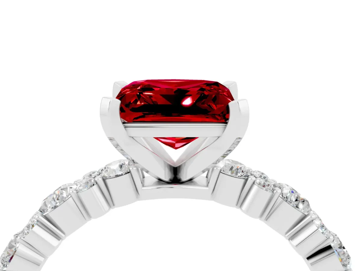 Princess Cut Ruby Side Stone Solitaire Ring with Round and Four-Prong Setting Platinum